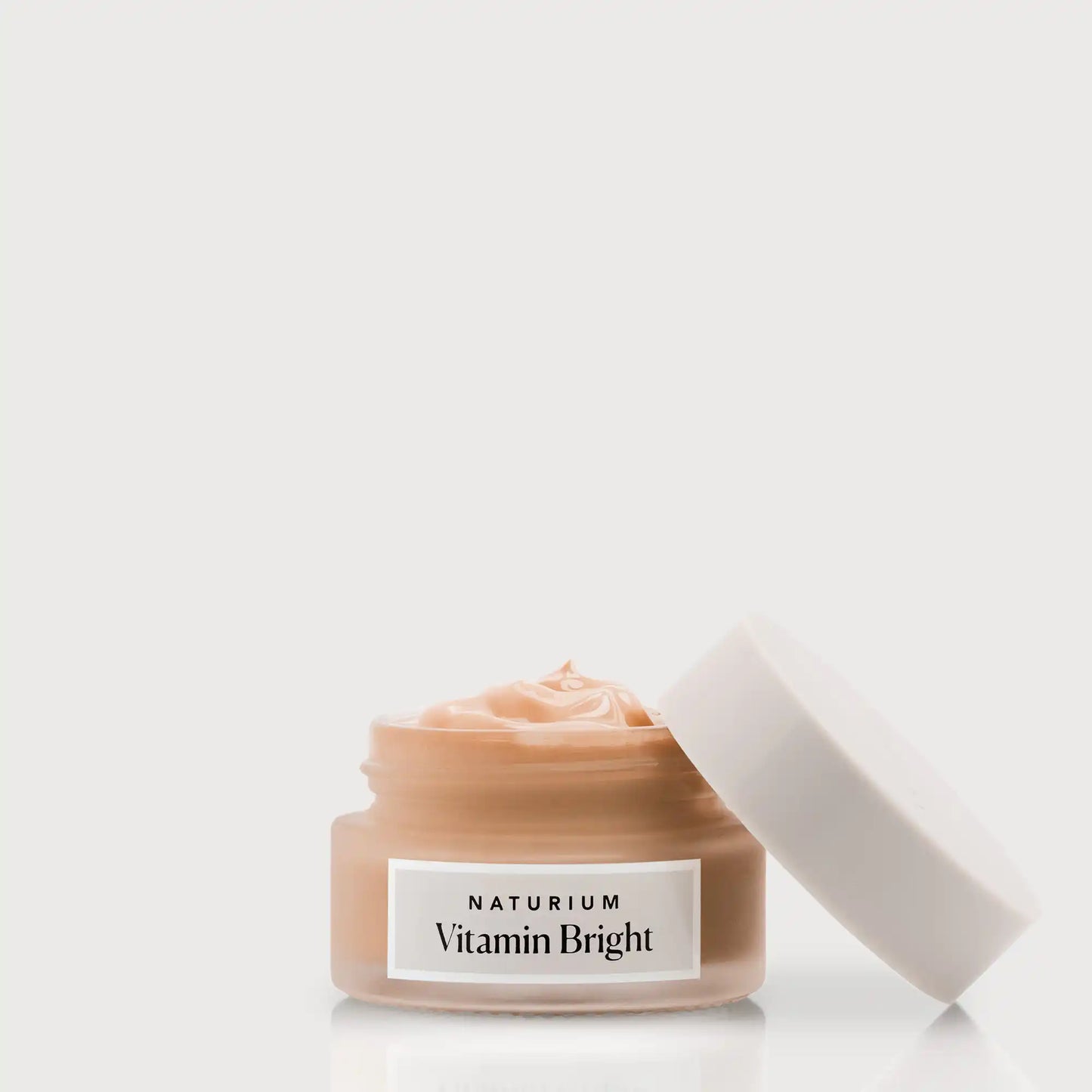 vitamin-bright-illuminating-eye-cream-d3 NATR-VitaminBright_DEEP_Primary_front_openjar_bone.webp