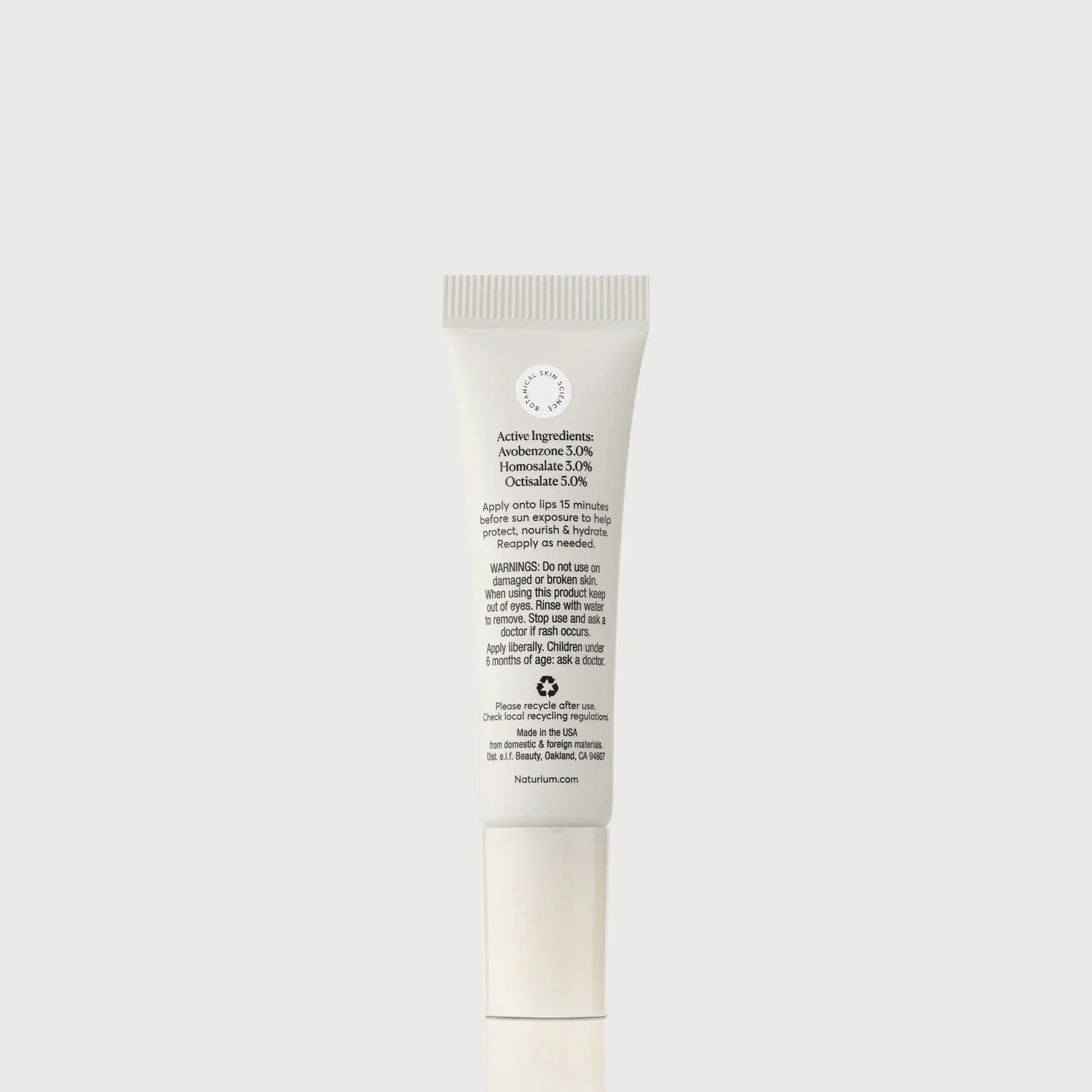 phyto-glow-lip-balm-spf-45-clear-r1 NATR-10124_PhytoGlow_SPF_Clear_primary_capon_back_bonebkgd_1.webp