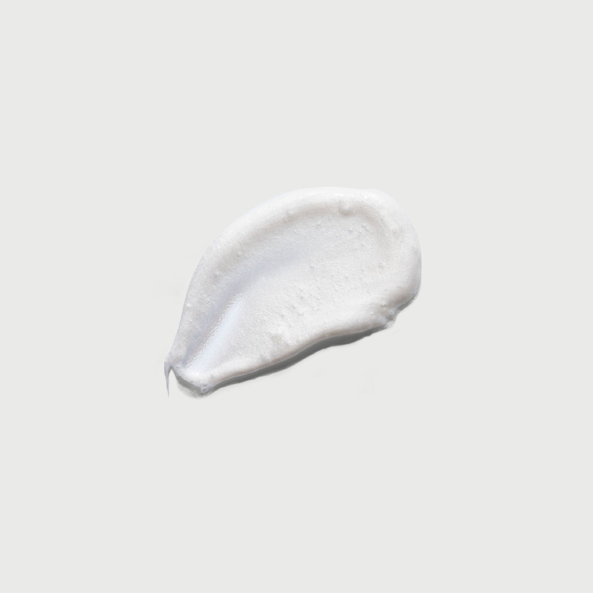 the-smoother-glycolic-acid-exfoliating-body-wash-a5 NATR-40002-Swatch-The-Smoother-Glycolic-Acid-Exfoliating-Body-Wash-bonebkgd.jpg