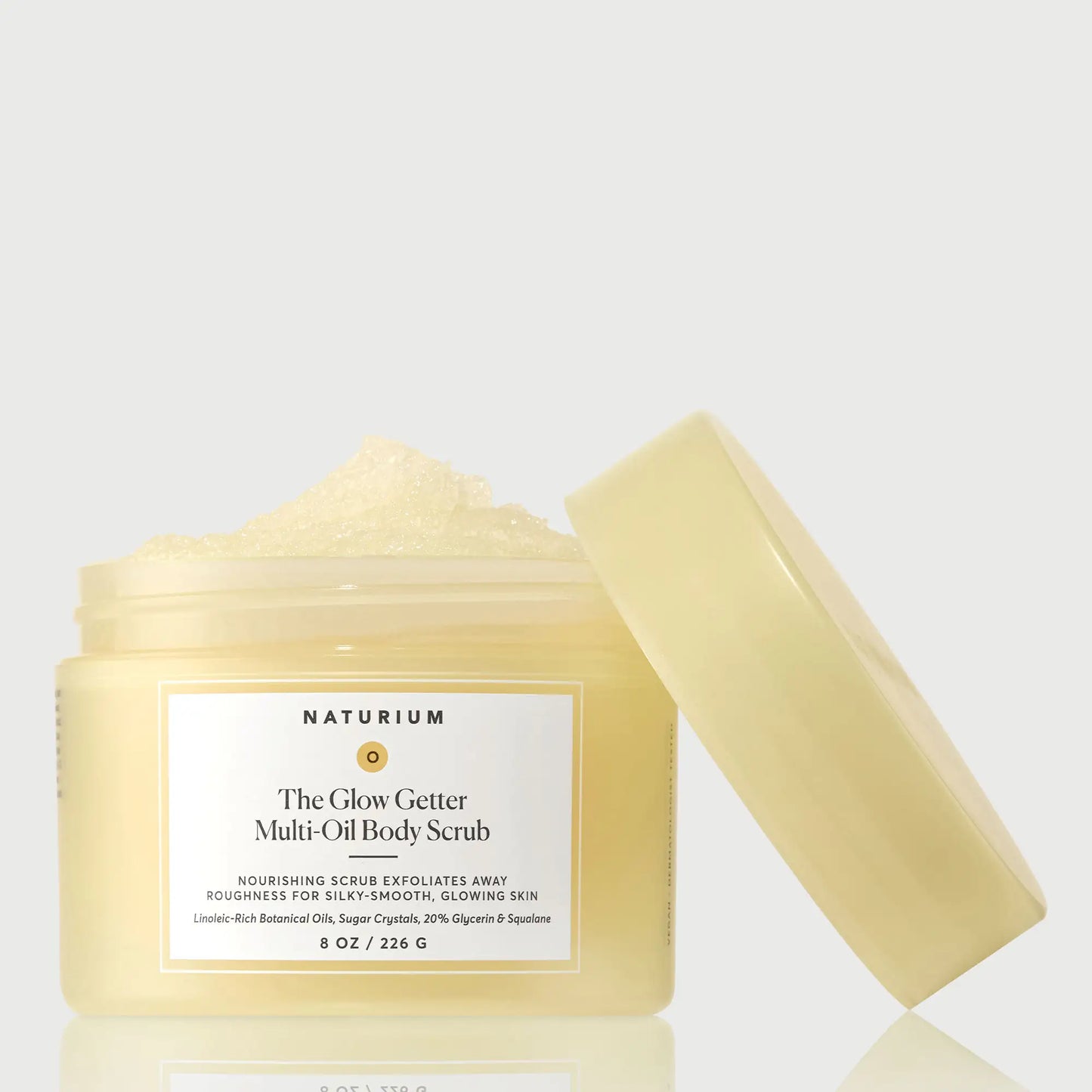 the-glow-getter-multi-oil-body-scrub-d4 NATR-40028-GlowGetter-Multi-Oil-Body-Scrub-Front-CapOff-bonebkgd.webp